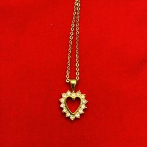 Gold plated heart with faux diamonds. 18”